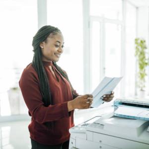 Woman using a photocopier