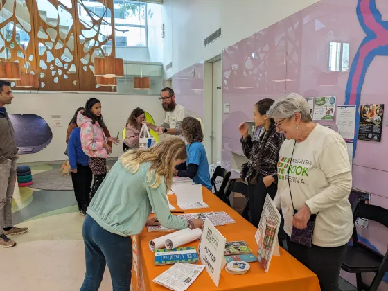 We Read Youth Voices Anthology Author Reception at Wisconsin Book Festival Fall Celebration October 2023 Signing Table