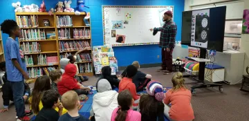 Rob Franklin instructs 4th grade students